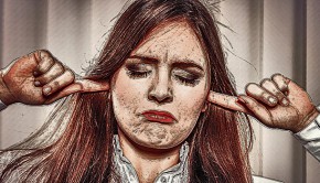 Stressed woman with closed eyes put fingers in ears,
